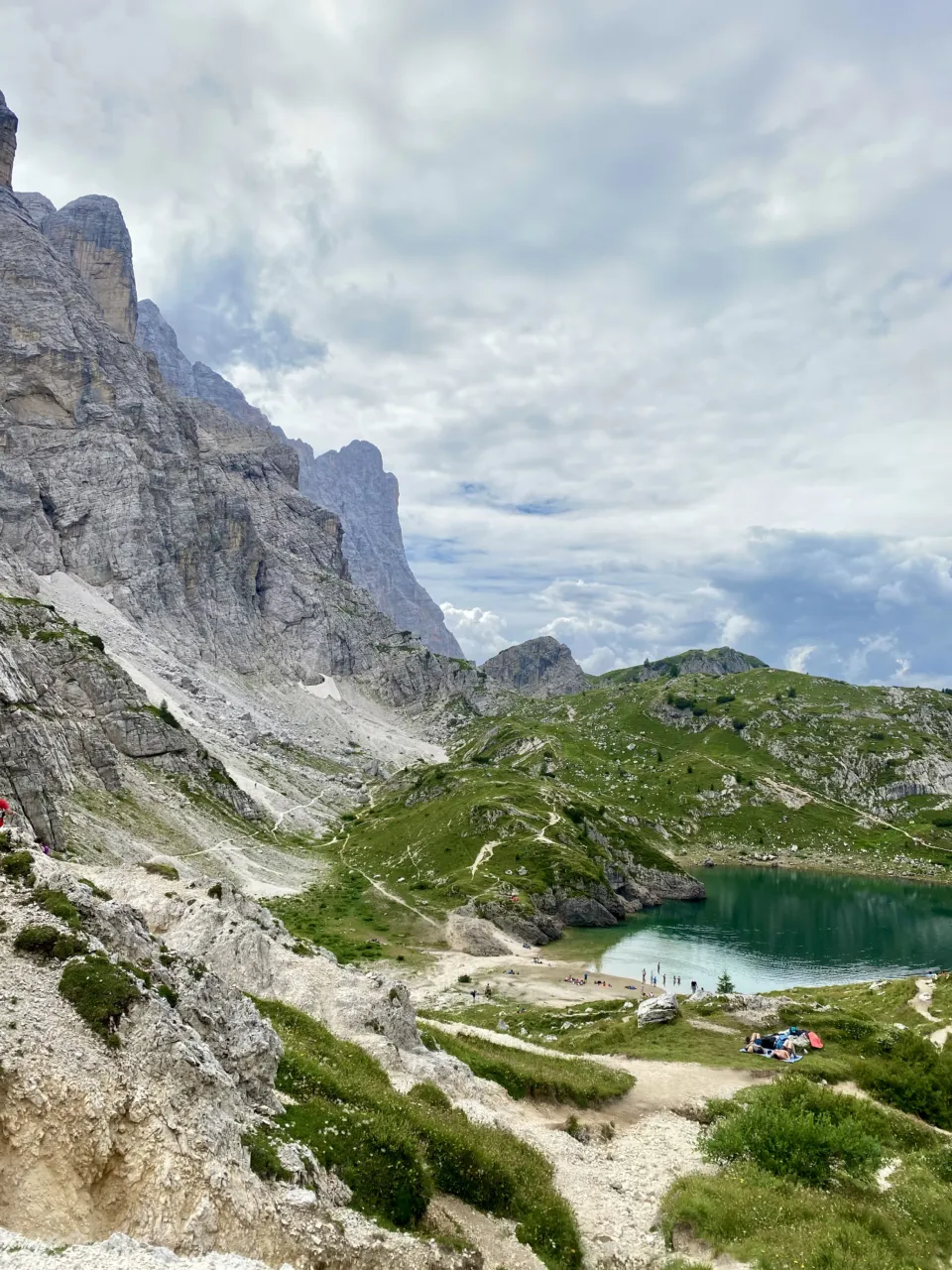 Lake Coldai seen from the trail, cradled beneath the Civetta walls